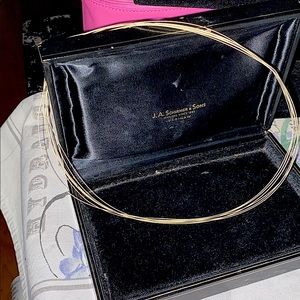 14k 6 strand necklace. Very pretty.